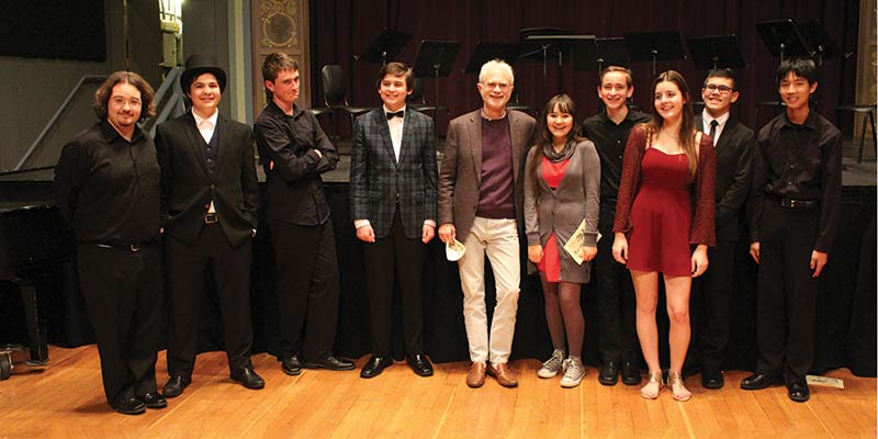 Crowden music school staff on stage