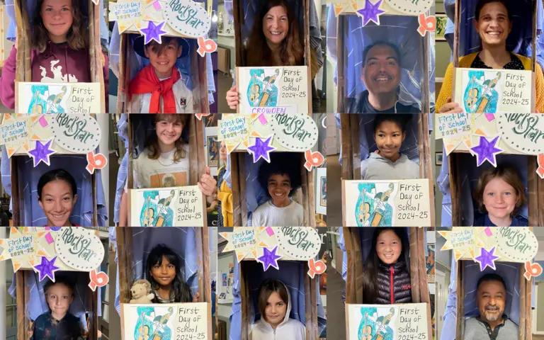 Students holding 'First Day of School' signs.