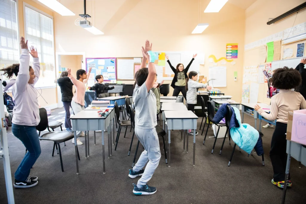 Children enjoying an indoor classroom activity.