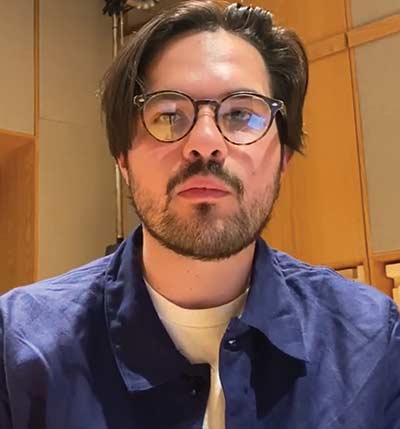 Person with glasses and beard in room