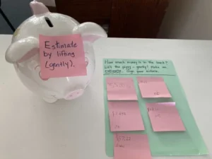 Piggy bank with money estimation notes.