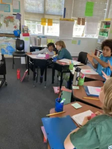 Students engaged in classroom discussion and activities.