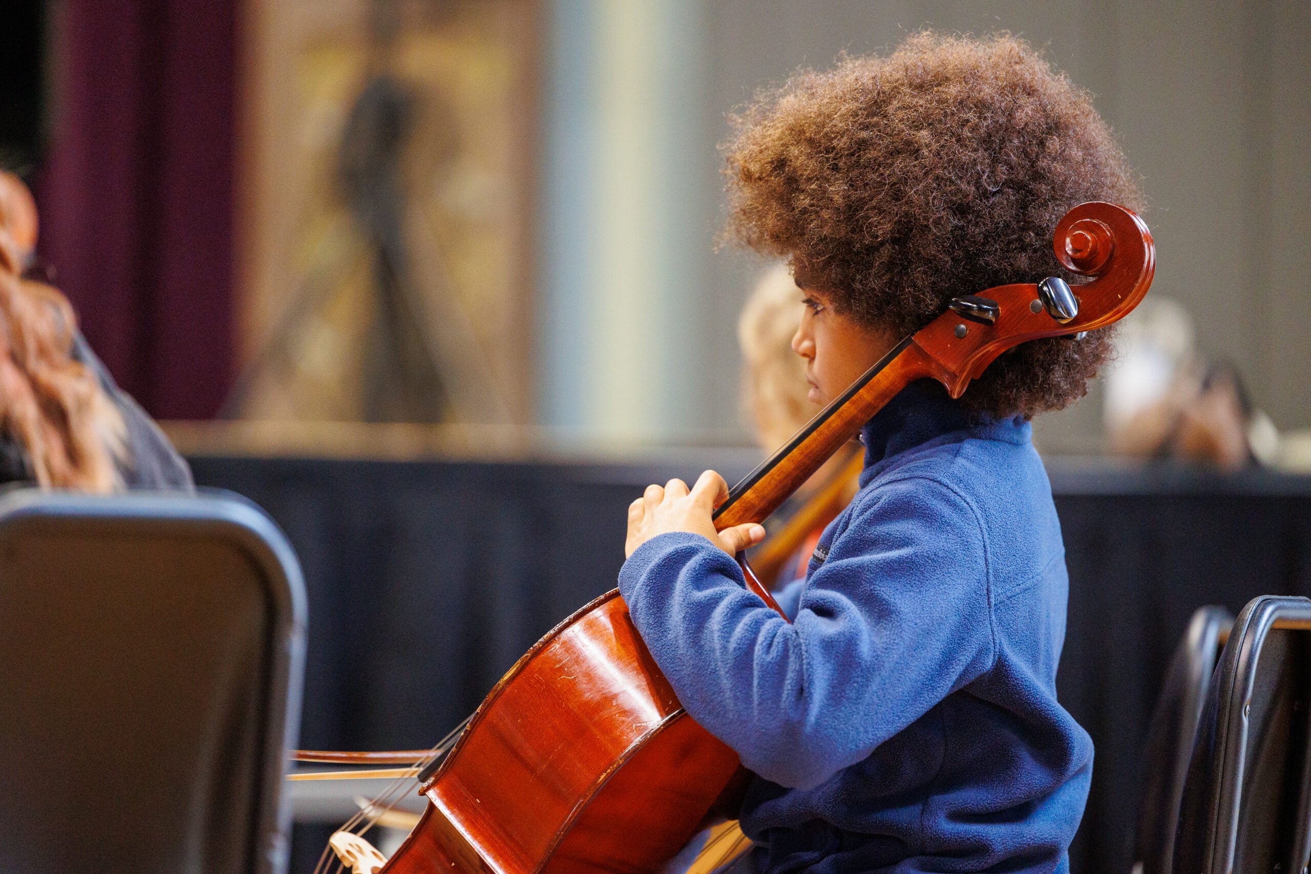 Student playing the cello
